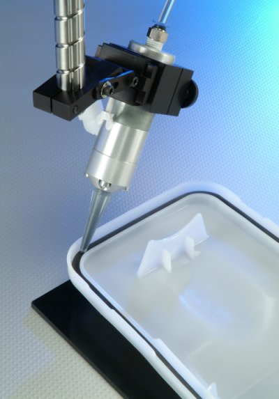 A form-in-place gasket being dispensed