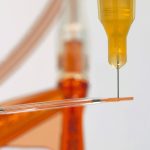 Fast curing catheter bonding adhesive