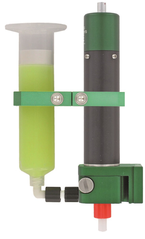 Positive displacement dispensing valve with disposable fluid path