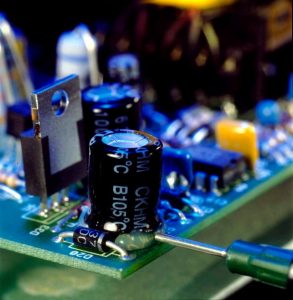 Ruggedizing electronic PCB components with Dymax adhesive