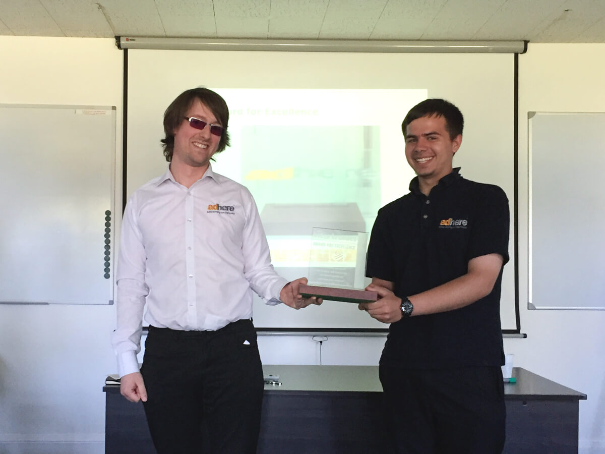 Guy Patching and James Heydon with the Award for Excellence