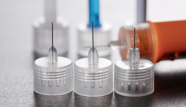 Next generation needle bonding adhesive