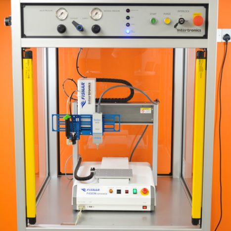 adhesive dispensing and curing robot