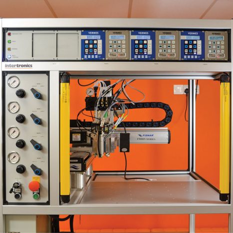 archytas series hot melt dispensing robot in enclosure