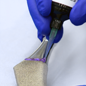 Application of Dymax Speedmask to orthopaedic implant