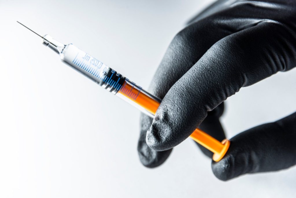 Very low extractables medical device adhesive withstands cleaning and sterilisation