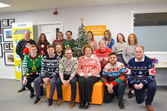 All of the Intertronics people in the main office festive enough to wear a Christmas jumper